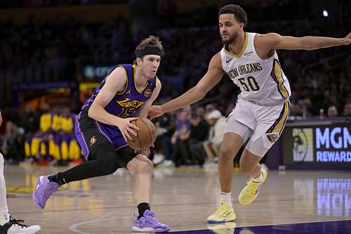 Lakers guard Austin Reaves (15) is defended by New Orleans Pelicans forward Jeremiah Robinson-Earl (50 - Source: Imagn
