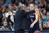 UConn Huskies head coach Geno Auriemma hugs guard Paige Bueckers (#5) during the second half of the 2025 NCAA national championship game against the South Carolina Gamecocks at Amalie Arena. Photo: Imagn