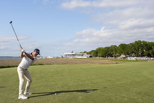 Justin Thomas hits his tee shot on 18 during the second round of the RBC Heritage golf tournament. - Source: Imagn