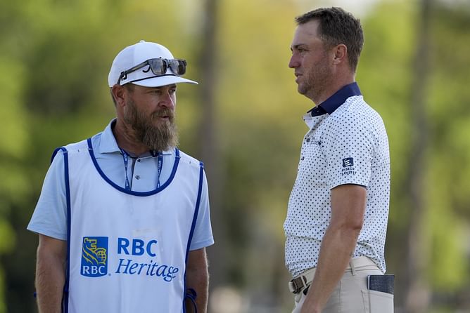 Justin Thomas sends a message to his caddie after finishing strongly at the RBC Heritage on Saturday