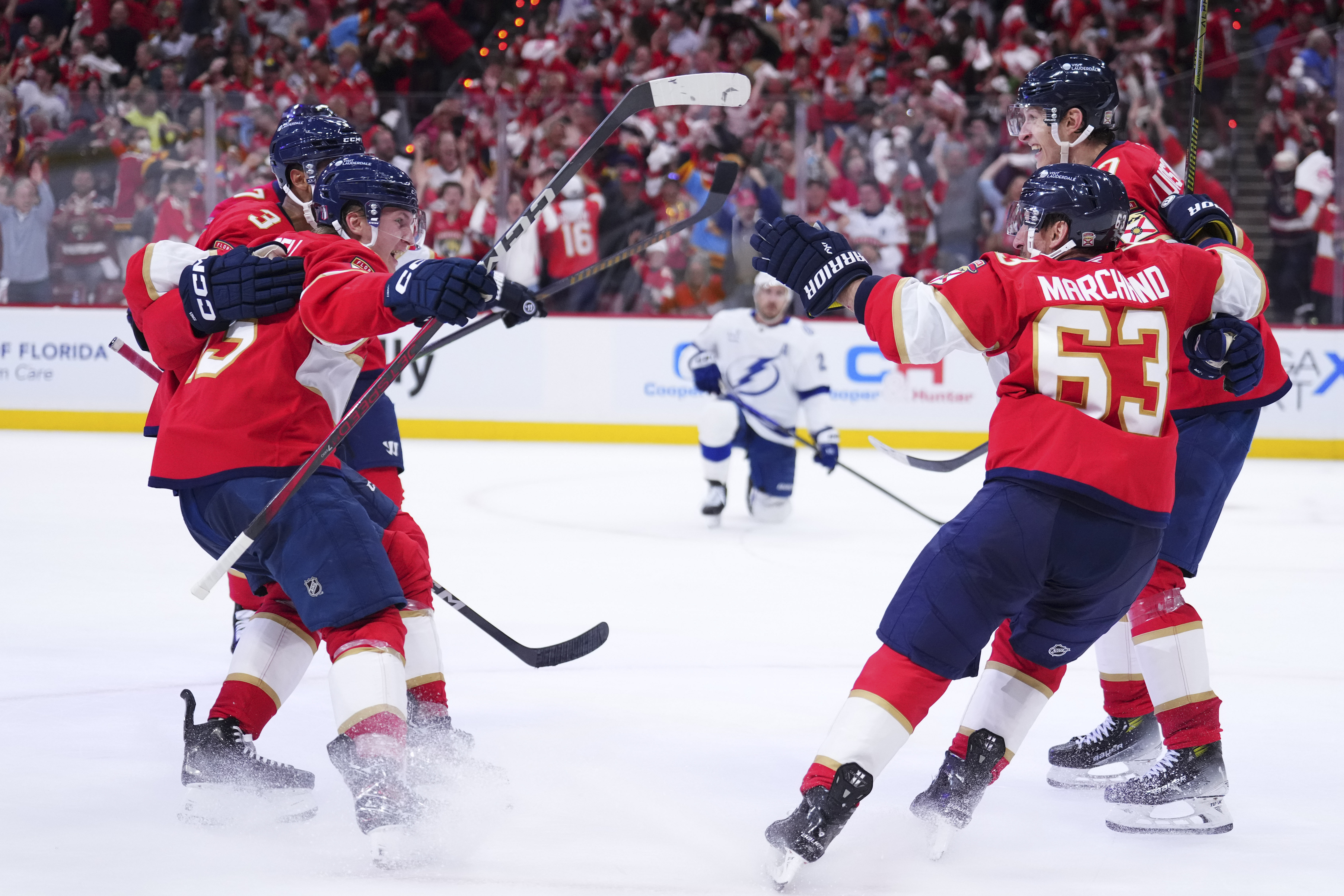 Apr 28, 2025; Sunrise, Florida, USA; Florida Panthers defenseman Seth Jones (3) celebrates with teammates after scoring against the Tampa Bay Lightning during the third period in game four of the first round of the 2025 Stanley Cup Playoffs at Amerant Bank Arena. Mandatory Credit: Rich Storry-Imagn Images - Source: Imagn