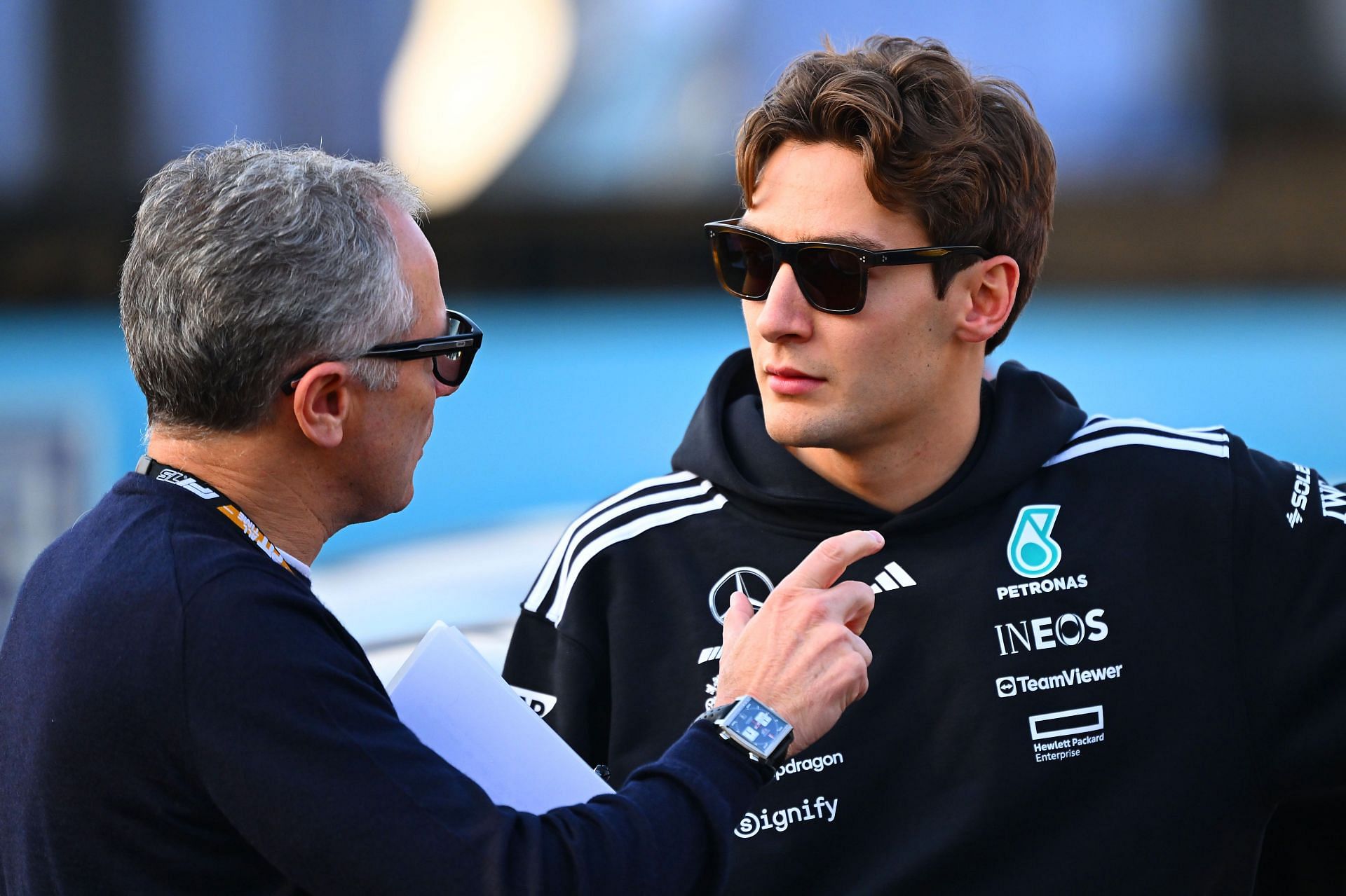 Stefano Domenicali talks with George Russell ahead of the F1 Grand Prix of China. Source: Getty