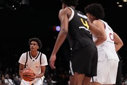 Gilbert Arenas' ex Laura Govan reacts as comedian Kenny Brooks shares a lighthearted moment with son Alijah Arenas