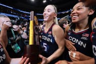 Paige Bueckers (#5) of the UConn Huskies holds the trophy after defeating the South Carolina Gamecocks during the NCAA Women's Basketball Tournament championship game at Amalie Arena on April 6, 2025 in Tampa, Florida. Photo: Getty