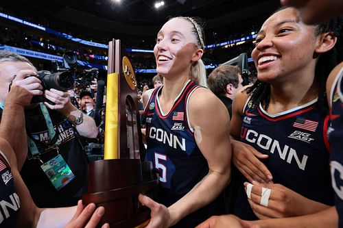 Paige Bueckers (#5) of the UConn Huskies holds the trophy after defeating the South Carolina Gamecocks during the NCAA Women's Basketball Tournament championship game at Amalie Arena on April 6, 2025 in Tampa, Florida. Photo: Getty