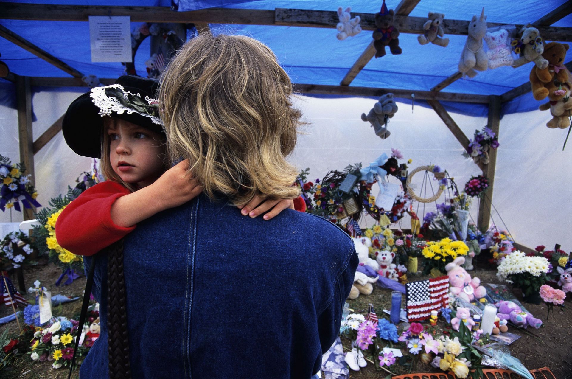 Woman at an Oklahoma City Bombing Memorial - Source: Getty