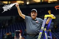 Head coach Kelvin Sampson of the Houston Cougars cuts the net down following his team's 69-50 victory against the Tennessee Volunteers in the Elite Eight round of the NCAA Tournament at Lucas Oil Stadium. Photo: Getty