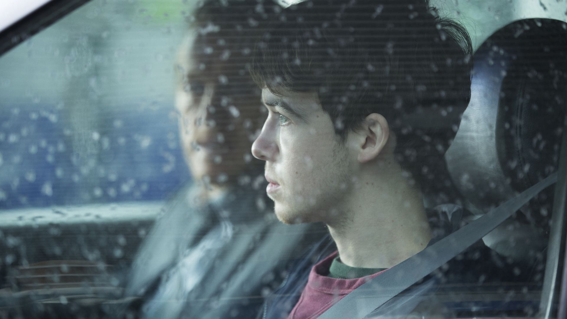Kenny is forced into disturbing acts by blackmail, with exposure as the constant threat (Image via Netflix)