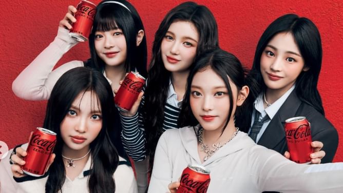 “One of the domestic target campaigns” — Coca-Cola clarifies NewJeans partnership status amid ADOR feud and NMIXX’s Haewon feature