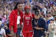 Kahleah Copper (#7) of Team USA celebrates the gold medal win with Lisa Leslie and Dawn Staley during the Paris 2024 Summer Olympic Games on August 11, 2024 in Paris, France. Photo: Getty