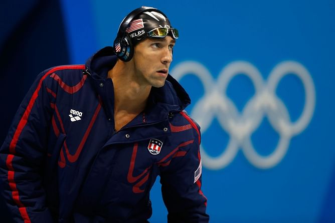 Water safety advocate Michael Phelps reacts to being featured in special promotion for pool safety awareness in Florida