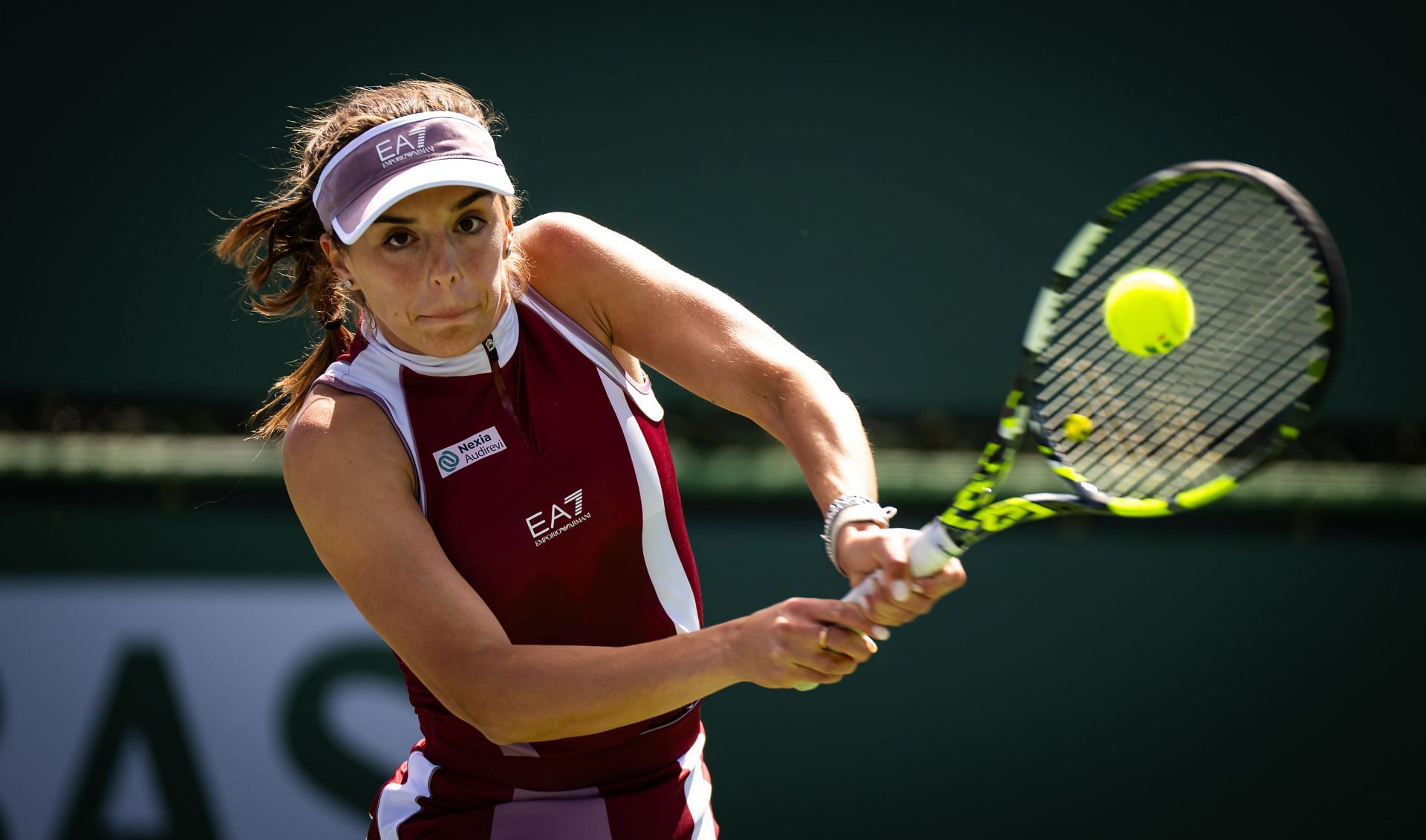 Lucia Bronzetti of Italy in action against Anhelina Kalinina of Ukraine in the first round on Day 2 of the BNP Paribas Open in Indian Wells. Source: Getty