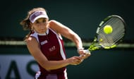 Lucia Bronzetti of Italy in action against Anhelina Kalinina of Ukraine in the first round on Day 2 of the BNP Paribas Open in Indian Wells. Source: Getty