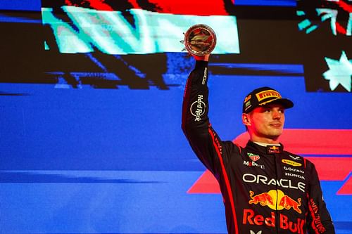 Max Verstappen raises his trophy on the podium after the Saudi GP - Source: Getty