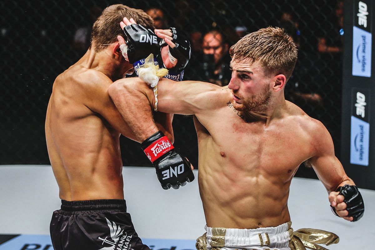 Jonathan Haggerty in the midst of throwing his spinning elbow. [Photo via: ONE Championship]