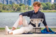 Jannik Sinner with his 2025 Australian Open trophy - Source: Getty