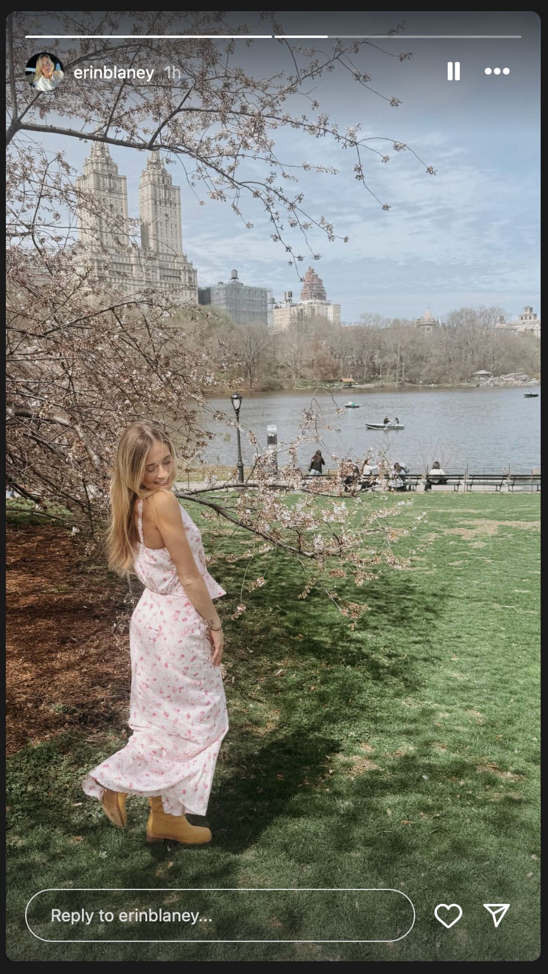 Erin Blaney shares a candid picture as she poses in a beautiful white dress