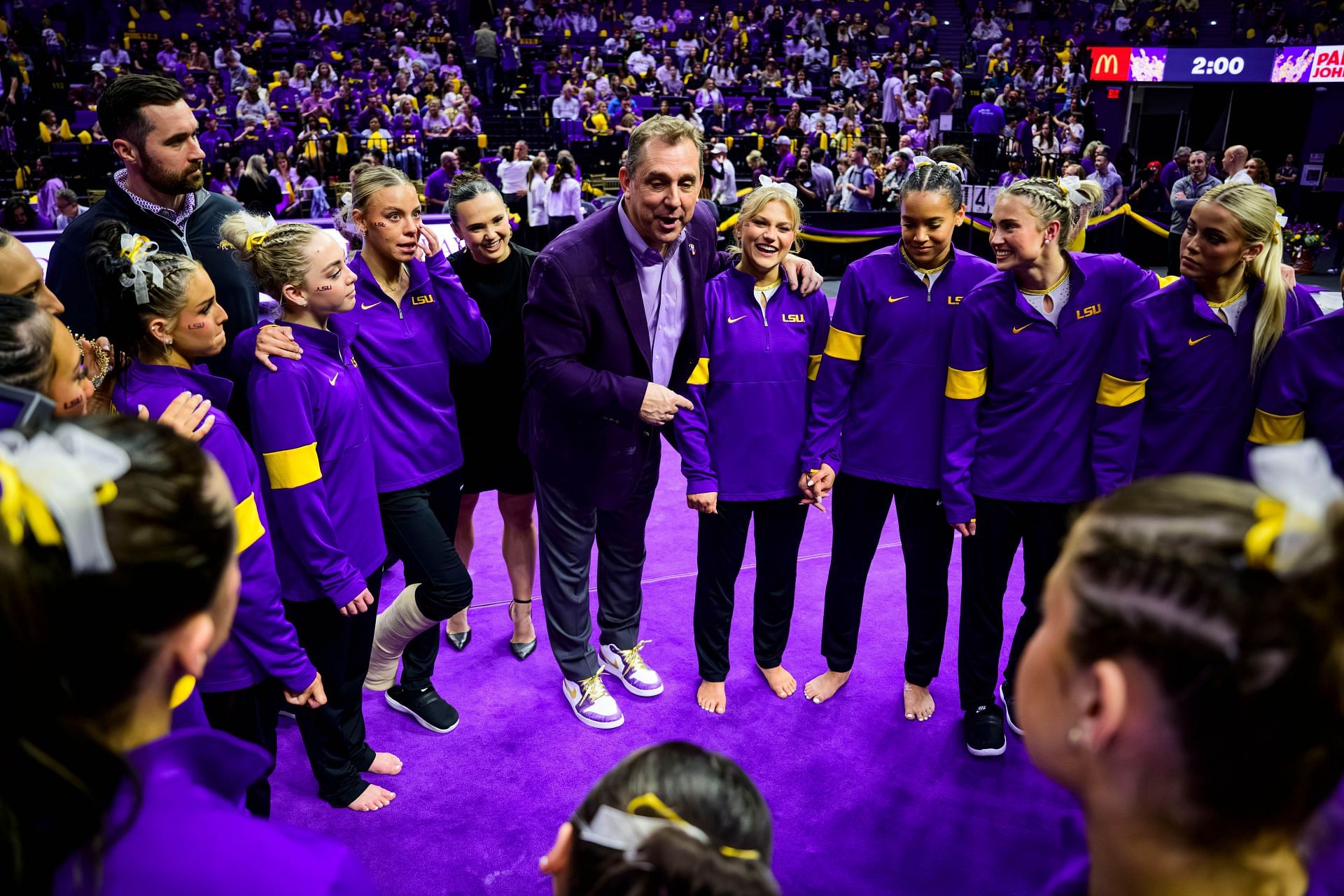 Dunne and the LSU team (Image Source: Getty)