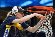 UConn star Paige Bueckers cuts down the net following the Huskies' win over the South Carolina Gamecocks in the final of the 2025 NCAA Tournament at Amalie Arena. Photo: Getty