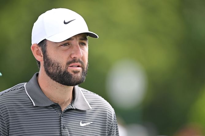How did defending champion Scottie Scheffler perform in Round 3 of The Masters?
