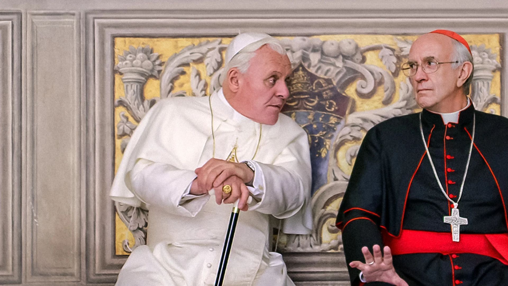 The movie follows the Bishop of Rome urging a cardinal to reconsider resigning (Image via Netflix)