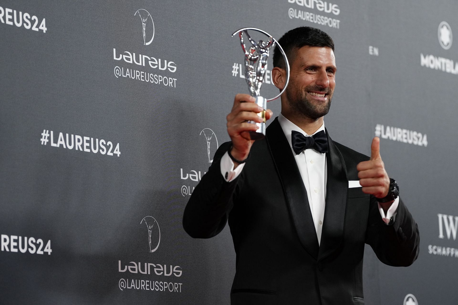 Novak Djokovic with his award- Source: Getty