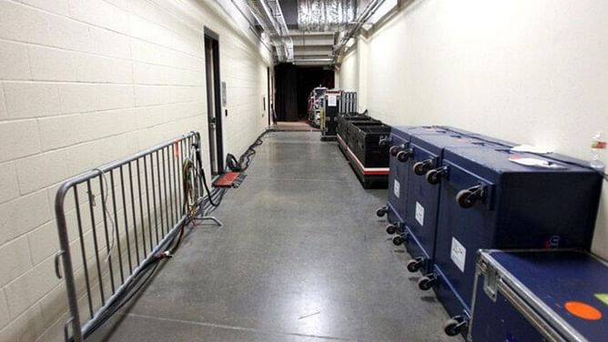 Huge WWE star is currently separated from locker room; dresses away from co-workers, says Jonathan Coachman