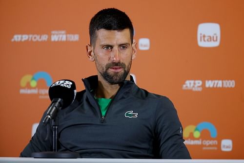 Novak Djokovc pictured speaking at a press conference [Image Source: Getty Images]