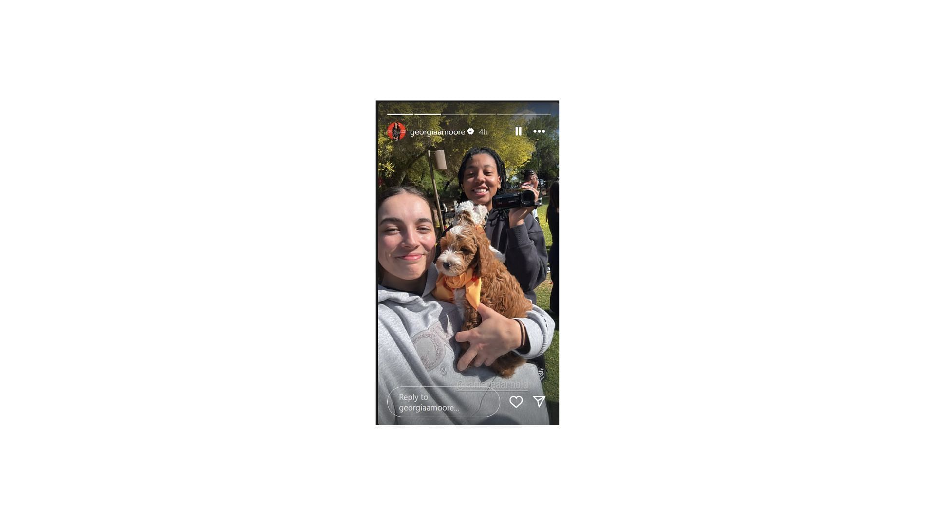UConn&#039;s Kamorea Arnold and former Kentucky star Georgia Amoore hang out with puppies at Kelsey Plum&#039;s Dawg Class (Image by Instagram/@georgiaamoore)
