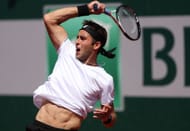 Tomas Martin Etcheverry of Argentina in action against Alex De Minaur of Australia during the Men's Second Round match on Day Five of the 2023 French Open. Source: Getty Source: Getty