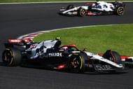Yuki Tsunoda leads Liam Lawson during the F1 Grand Prix of Japan at Suzuka International Racing Course on September 24, 2023 in Suzuka, Japan - Source: Getty