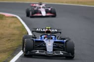 Carlos Sainz of Spain driving the (55) Williams FW47 Mercedes leads Esteban Ocon of France driving the (31) Haas F1 VF-25 Ferrari on track during the F1 Grand Prix of Japan - Source: Getty