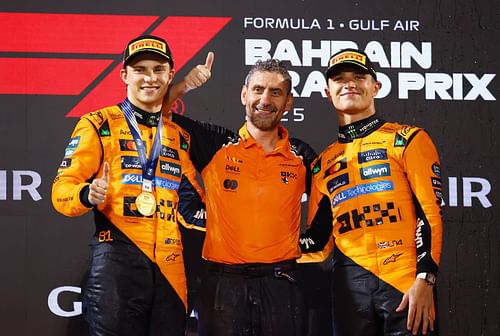 Oscar Piastri (L), Andrea Stella, and Lando Norris (R) at the F1 Grand Prix of Bahrain podium - Source: Getty