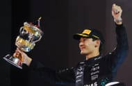 Second-placed George Russell on the podium with his trophy during the F1 Grand Prix of Bahrain at Bahrain International Circuit on April 13, 2025 - Source: Getty