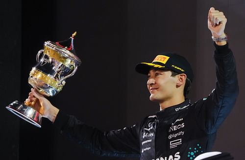 Second-placed George Russell on the podium with his trophy during the F1 Grand Prix of Bahrain at Bahrain International Circuit on April 13, 2025 - Source: Getty