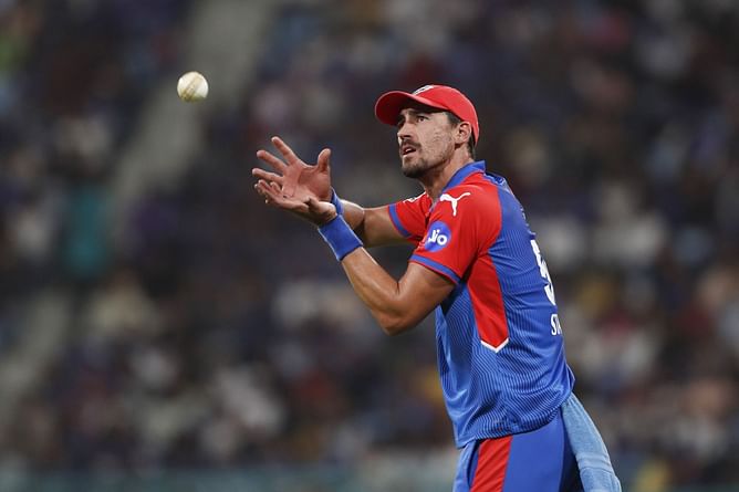 Mitchell Starc takes an excellent composed catch on the boundary ropes to dismiss Rinku Singh for 36 in DC vs KKR IPL 2025 match