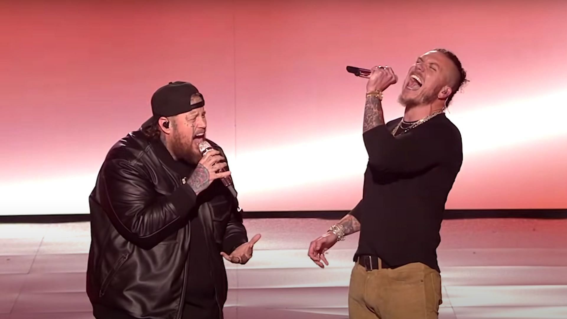 Jelly Roll and Brandon Lake performing 