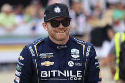 Conor Daly's girlfriend shines in black top and fur overcoat in Saturday night update on IG