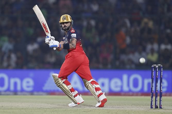 Fans run behind Virat Kohli as he leaves stadium in his own car after DC vs RCB IPL 2025 match [Watch]