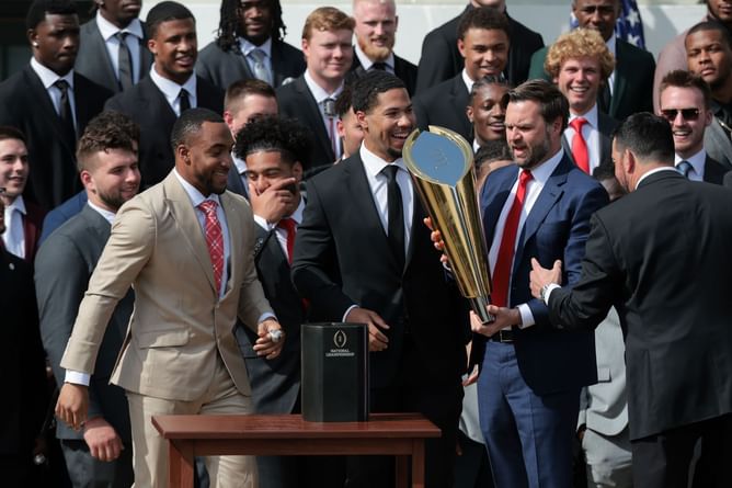 VP JD Vance nearly fumbles Ohio State's national championship trophy during Ryan Day & Co.'s White House visit