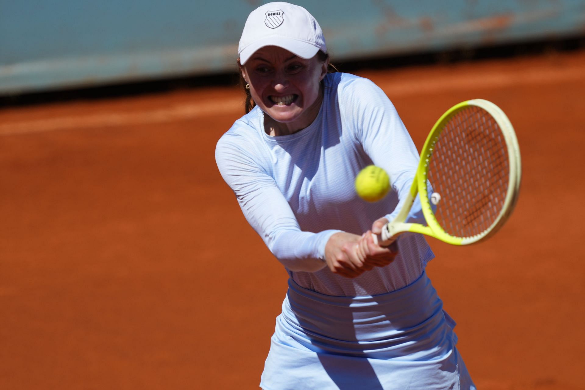 Aliaksandra Sasnovich hits a backhand in Madrid | Image Source: Getty
