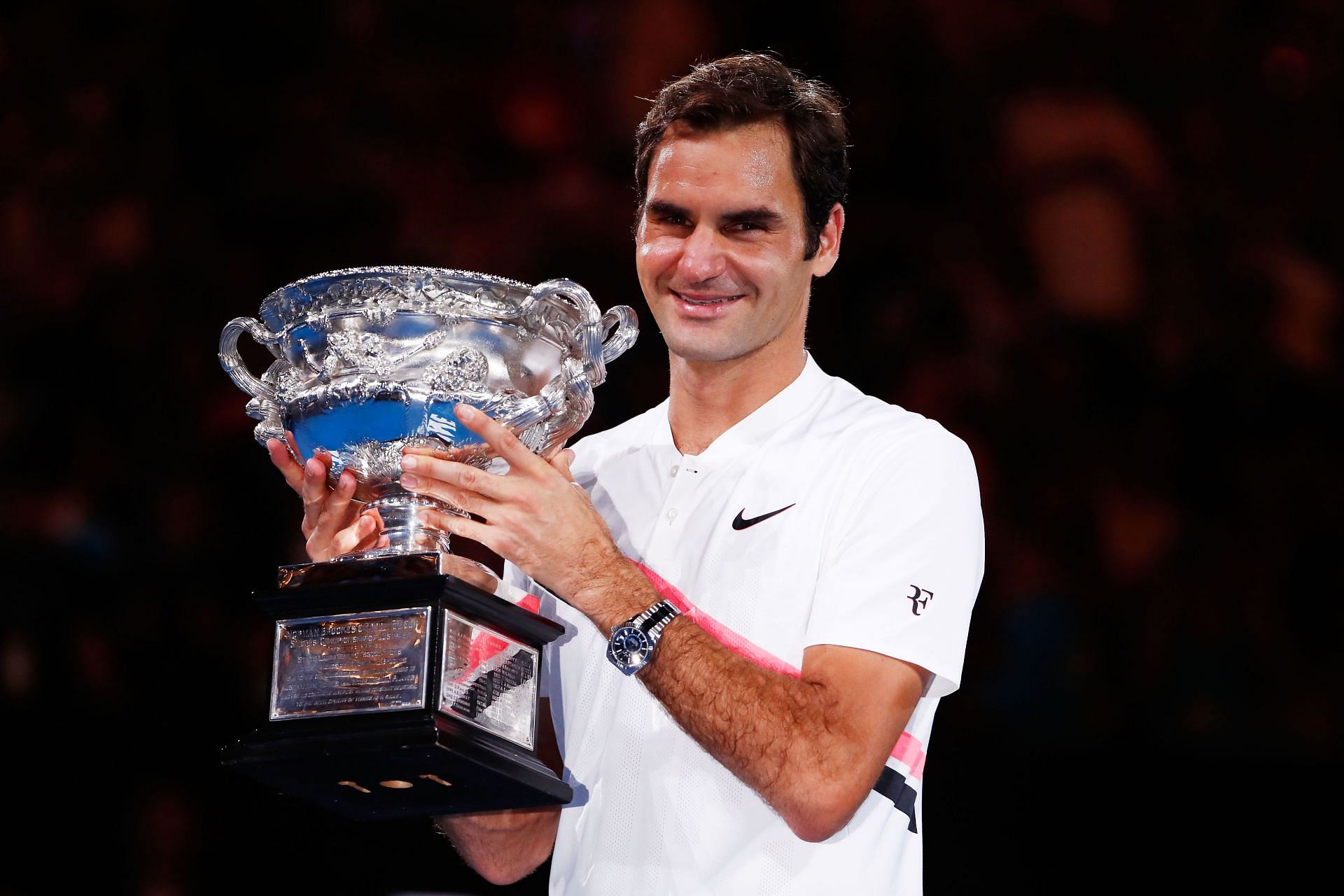 Roger Federer with the 2018 Australian Open trophy [Image Source: Getty Images]