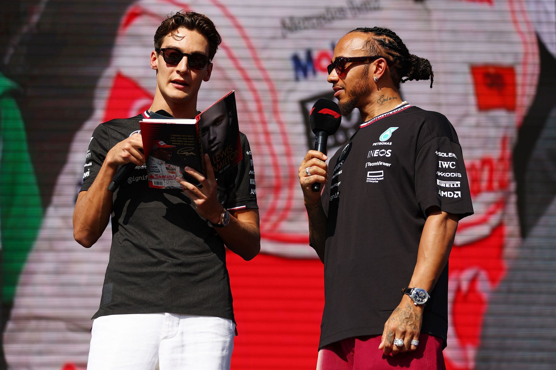 George Russell [L] with Lewis Hamilton [R] at the F1 Grand Prix of Abu Dhabi - Source: Getty