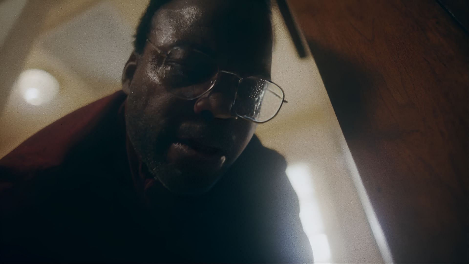 Josh crawls toward the mailbox, trying to send his last hope for rescue in Dead Mail. (Image via YouTube/Shudder)