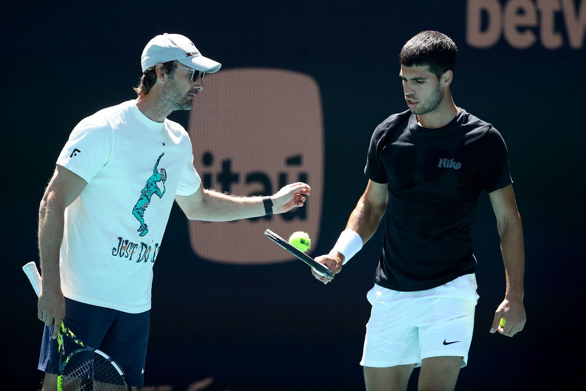 Carlos Alcaraz with coach Juan Carlos Ferrero at the Miami Open Presented by Itau 2025 - Day 1 - Source: Getty