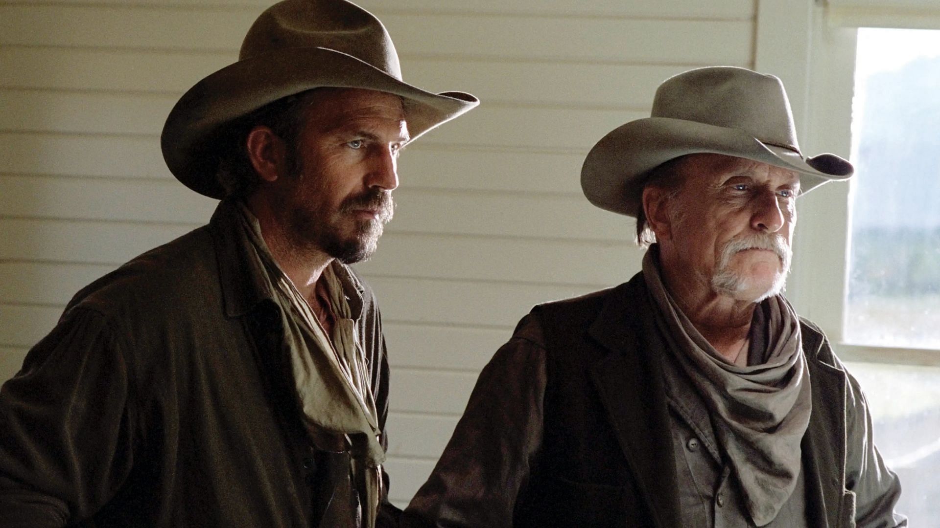 The cowboys in Open Range face their pasts and resist corruption as tensions rise (Image via Apple TV+)