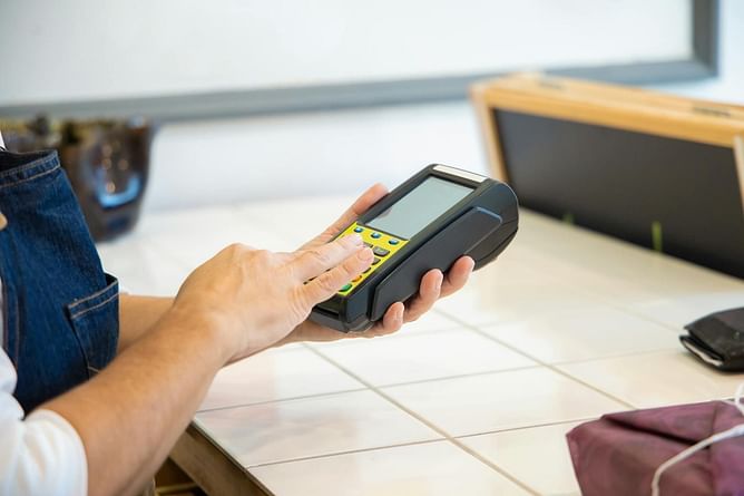 "God said give with a cheerful heart, not a tap to pay!" — Internet divided over viral clip of church using credit card machine during offering