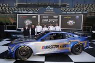 (L-R) Rick Hendrick (team owner), Jeff Gordon (VC), and Chad Knaus (VP) at the NASCAR unveiling of the Next Gen Chevrolet Camaro ZL1 at Daytona - Source: Getty