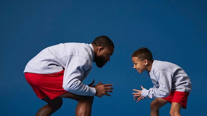 "I’m the famous wrestler, not you"- Jordan Burroughs makes feelings known as he brings his son to photoshoot with Kennedy Blades