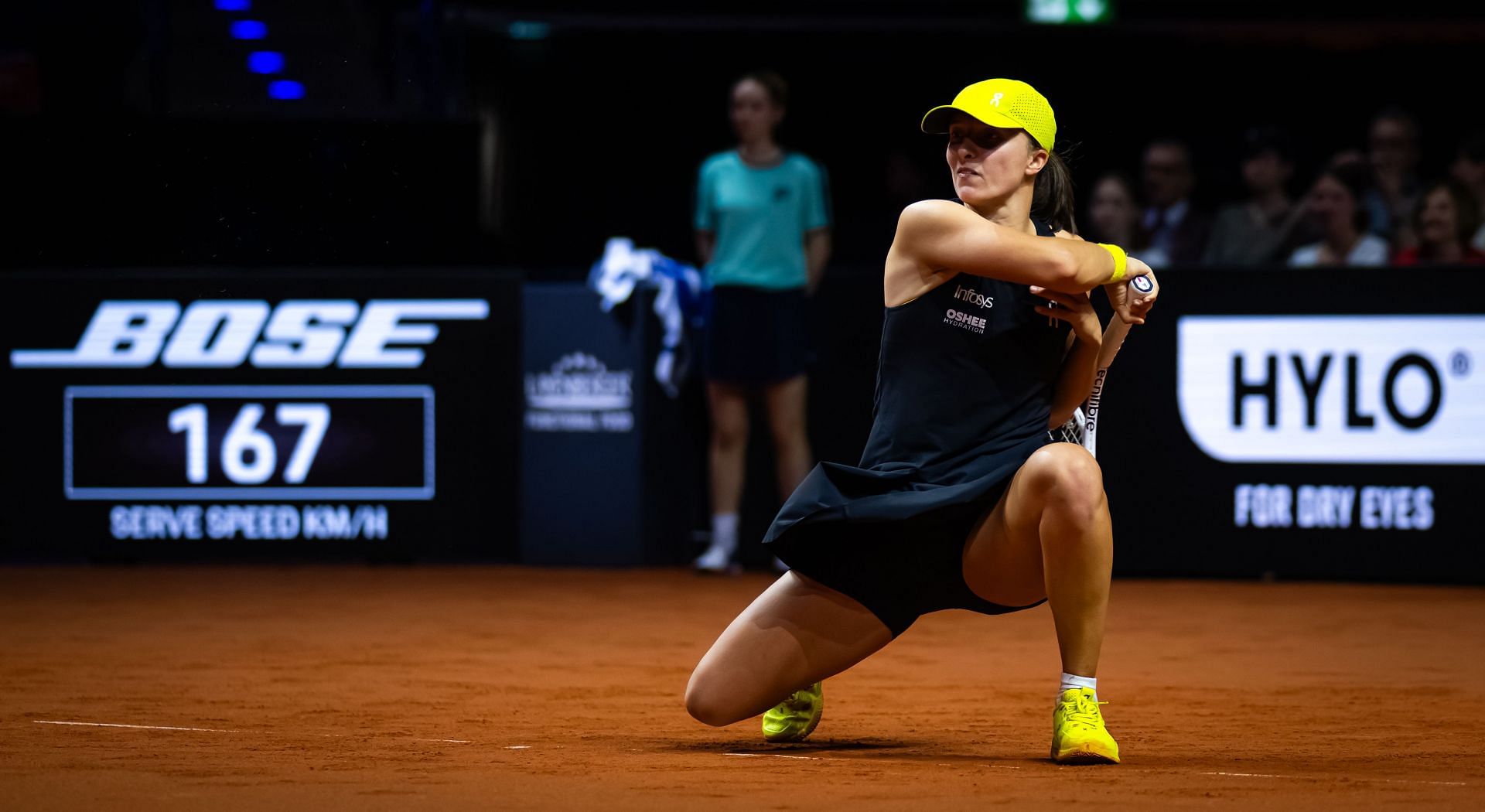 Iga Natalia Swiatek of Poland in action against Jana Fett of Croatia in the second round on Day 3 of the Porsche Tennis Grand Prix. Source: Getty